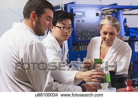 Picture - Engineering students in a laboratory. Fotosearch