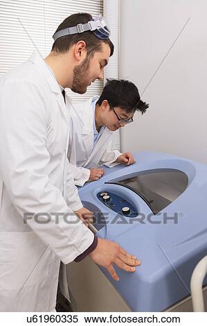 Stock Photography - Engineering students in a laboratory. Fotosearch