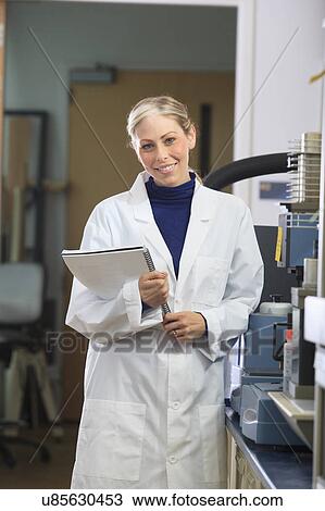 Stock Image - Engineering students in chemistry laboratory. Fotosearch