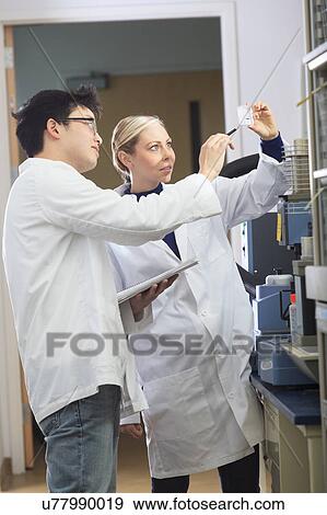 Stock Photo - Engineering students in chemistry laboratory. Fotosearch