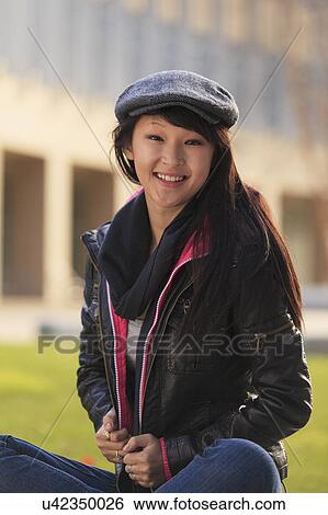 Stock Photograph - Portrait of a teenage girl smiling. Fotosearch