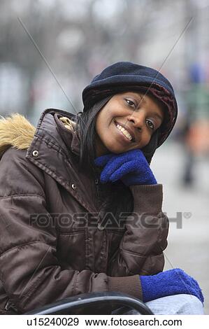 Portrait of a woman smiling View Large Photo Image Stock Photo - Portrait of a woman smiling. Fotosearch