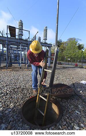 Power engineers at work View Large Photo Image Stock Photo - Power engineers at work. Fotosearch