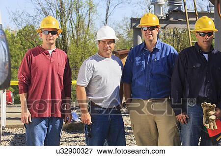 Stock Photo - Power engineers at work. Fotosearch