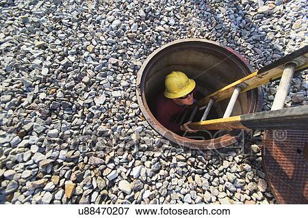 Stock Photo - Power engineers at work. Fotosearch