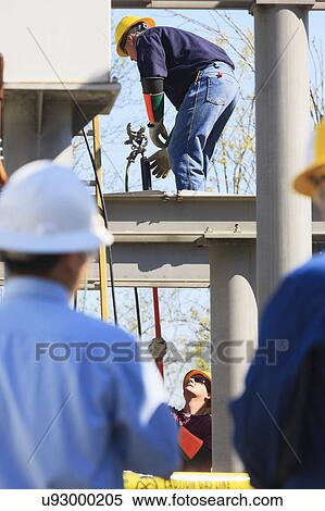 Stock Photography - Power engineers at work. Fotosearch