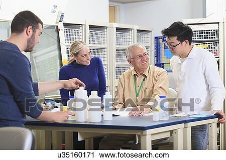 Professor with students in chemical laboratory View Large Photo Image Stock Image - Professor with students in chemical laboratory. Fotosearch