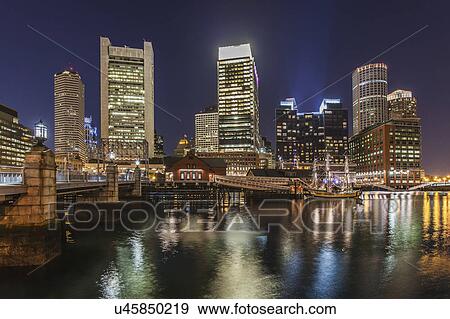 Skyscrapers lit up at night, Boston, USA View Large Photo Image Stock Photo - Skyscrapers lit up at night, Boston, USA. Fotosearch