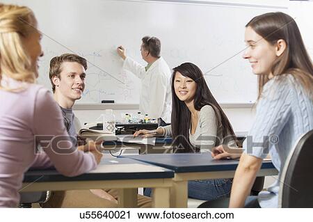 Students seated in an engineering classroom View Large Photo Image Stock Image - Students seated in an engineering classroom. Fotosearch