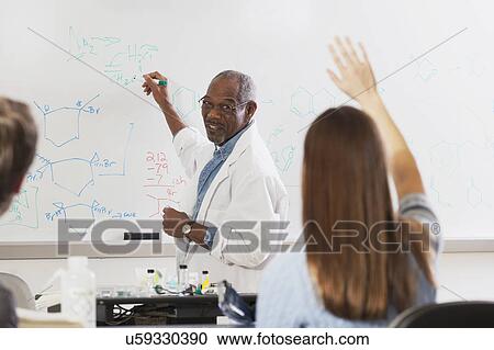 Students seated in an engineering classroom View Large Photo Image Stock Image - Students seated in an engineering classroom. Fotosearch