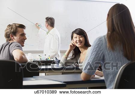 Stock Photo - Students seated in an engineering classroom. Fotosearch