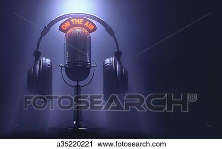 Stock Image - Vintage microphone and headphones. Fotosearch