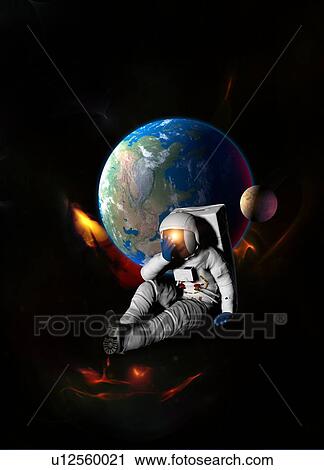 Stock Image - Astronaut with planet earth. Fotosearch