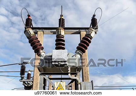 Stock Image - Cables and insulators in electricity substation. Fotosearch