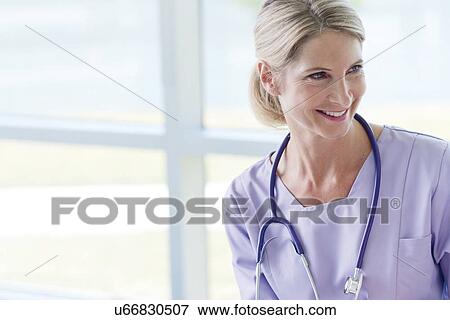 Care worker smiling View Large Photo Image Stock Photo - Care worker smiling. Fotosearch