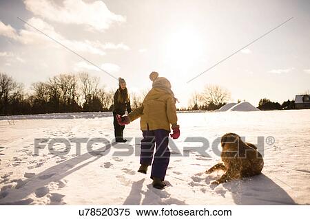 Children playing with their golden retriever, Lakefield, Ontario, Canada View Large Photo Image Stock Photography - Children playing with their golden retriever, Lakefield, Ontario, Canada. Fotosearch
