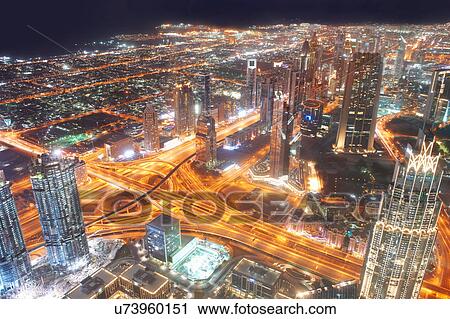 Cityscape at night showing light trails, elevated view, Dubai, UAE View Large Photo Image Stock Image - Cityscape at night showing light trails, elevated view, Dubai, UAE. Fotosearch