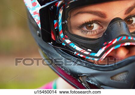 Close up portrait of female BMX rider in crash helmet View Large Photo Image Picture - Close up portrait of female BMX rider in crash helmet. Fotosearch