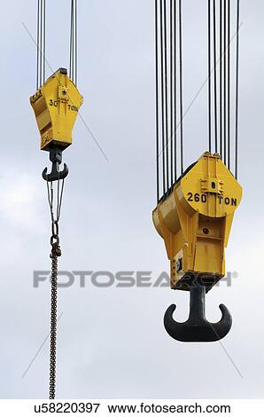 Crane hooks on construction site View Large Photo Image Stock Photo - Crane hooks on construction site. Fotosearch
