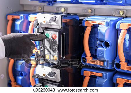 Stock Image - Detail of interior of electricity substation components. Fotosearch