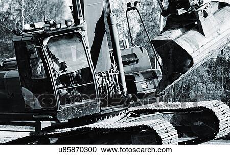 Earth mover on construction site View Large Photo Image Stock Image - Earth mover on construction site. Fotosearch