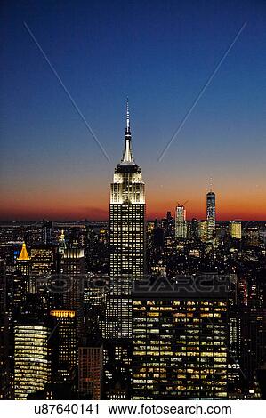 Stock Image - Elevated view of Empire State Building at night, New York City, USA. Fotosearch