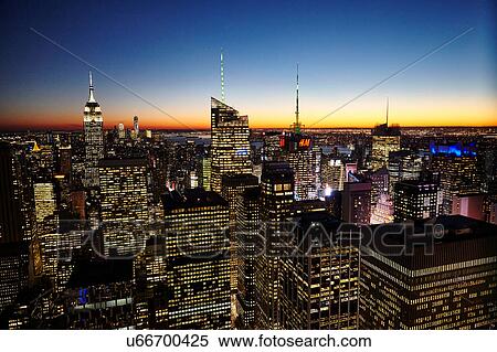 Stock Photography - Elevated view of skyline at night with Empire State Building, New York City, USA. Fotosearch