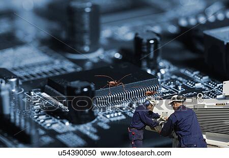 Stock Image - Engineers and circuit boards. Fotosearch
