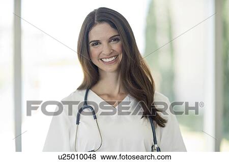 Female medical professional smiling View Large Photo Image Stock Photo - Female medical professional smiling. Fotosearch