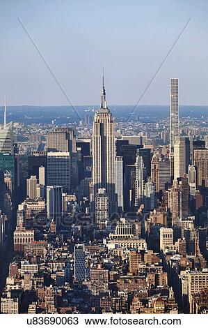 Stock Image - High angle view of Empire State building from One World Trade Observatory, New York City, USA. Fotosearch