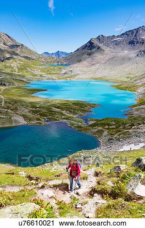 Stock Image - Hiker, Davos, Graubnden, Switzerland. Fotosearch
