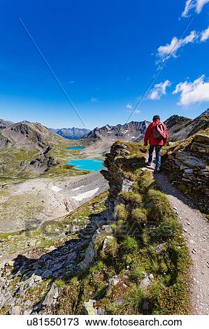 Stock Image - Hiker, Davos, Graubnden, Switzerland. Fotosearch