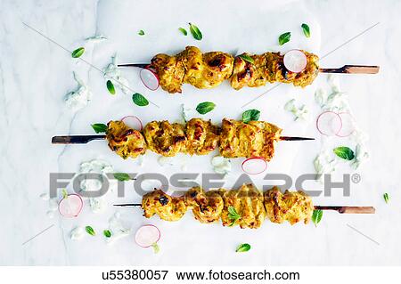 Indian spiced skewers View Large Photo Image Stock Photo - Indian spiced skewers. Fotosearch