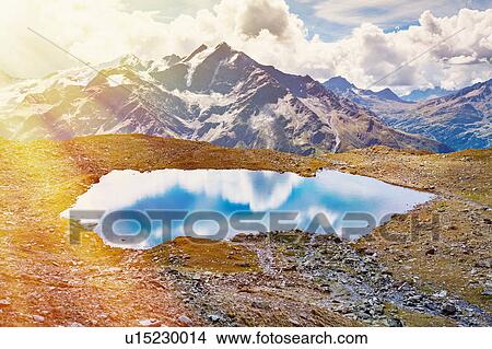 Picture - Lake in mountains, Santa Caterina Valfurva, Bormio, Italy. Fotosearch