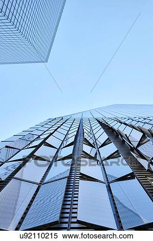 Stock Photography - Low angle view of One World Trade Center and blue sky, New York City, USA. Fotosearch