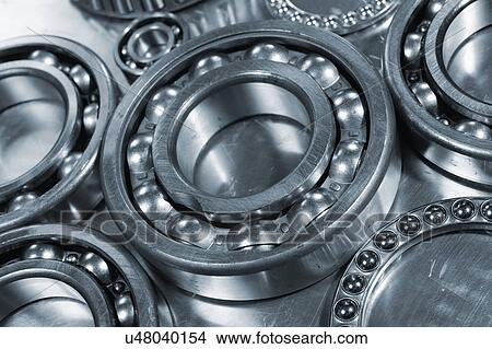 Picture - Metal cogs, ball bearings and gears. Fotosearch