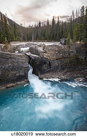 Stock Photo - Natural Bridge Falls, Kicking Horse River, Yoho National Park, Field, British Columbia, Canada. Fotosearch