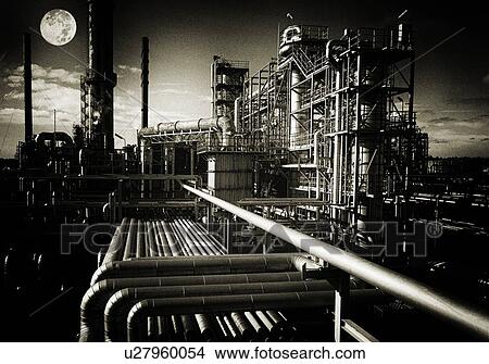 Oil and gas refinery at night View Large Photo Image Picture - Oil and gas refinery at night. Fotosearch