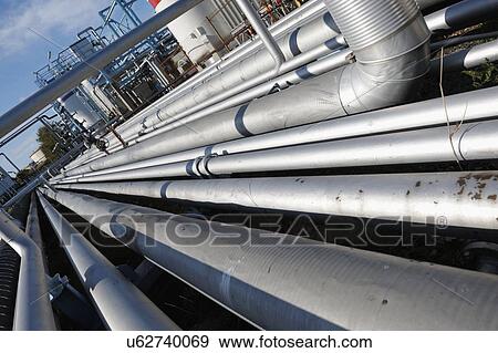Oil pipework on refinery View Large Photo Image Stock Photo - Oil pipework on refinery. Fotosearch