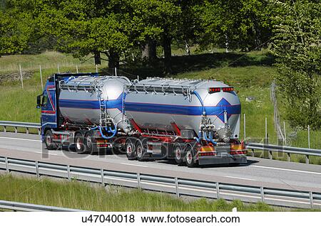 Stock Photo - Oil tanker driving on highway. Fotosearch