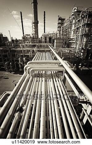 Stock Photo - Pipework on an oil and gas refinery. Fotosearch