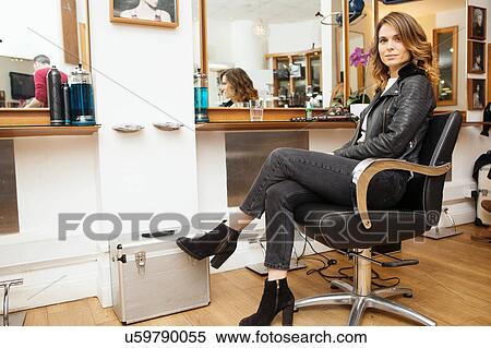 Portrait of female customer with styled brunette hair in hair salon View Large Photo Image Stock Photography - Portrait of female customer with styled brunette hair in hair salon. Fotosearch