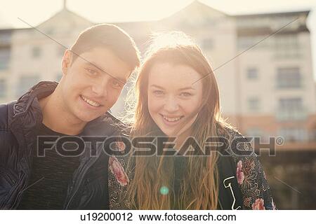 Portrait of two friends, outdoors, smiling, Bristol, UK View Large Photo Image Stock Image - Portrait of two friends, outdoors, smiling, Bristol, UK. Fotosearch