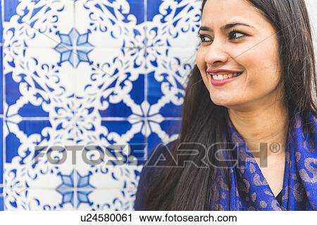 Portrait of woman in front of colourful tiled wall, Lisbon, Portugal View Large Photo Image Stock Image - Portrait of woman in front of colourful tiled wall, Lisbon, Portugal. Fotosearch