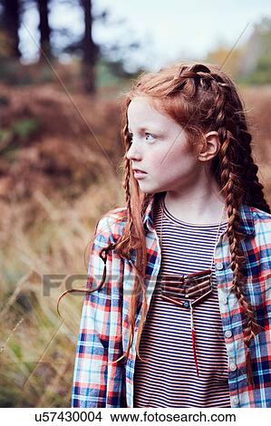 Picture - Portrait of young girl in rural setting. Fotosearch