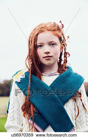 Stock Photo - Portrait of young girl in rural setting. Fotosearch