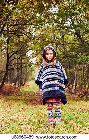Stock Photo - Portrait of young girl in rural setting. Fotosearch