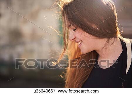 Portrait of young woman, outdoors, smiling, Bristol, UK View Large Photo Image Stock Photo - Portrait of young woman, outdoors, smiling, Bristol, UK. Fotosearch