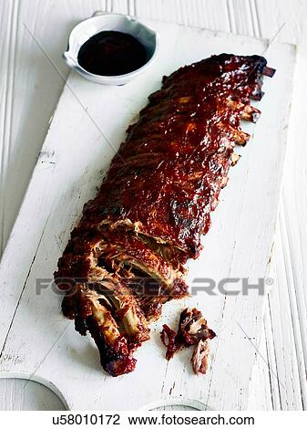 Rack of pork ribs View Large Photo Image Stock Image - Rack of pork ribs. Fotosearch