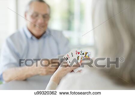 Senior couple playing cards View Large Photo Image Stock Image - Senior couple playing cards. Fotosearch